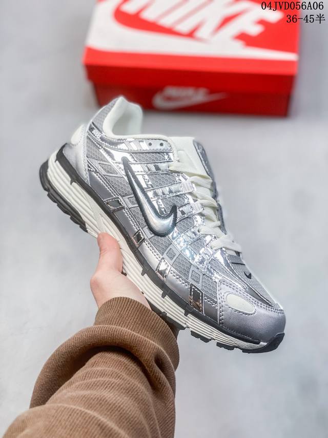 公司级耐克nike P-6000 女子跑鞋内外侧都用了红色的钩子，采用透气材料，搭配匠心覆面，再现千禧年代的跑鞋风格，塑就大气外观。鞋款秉承 Nike Pega